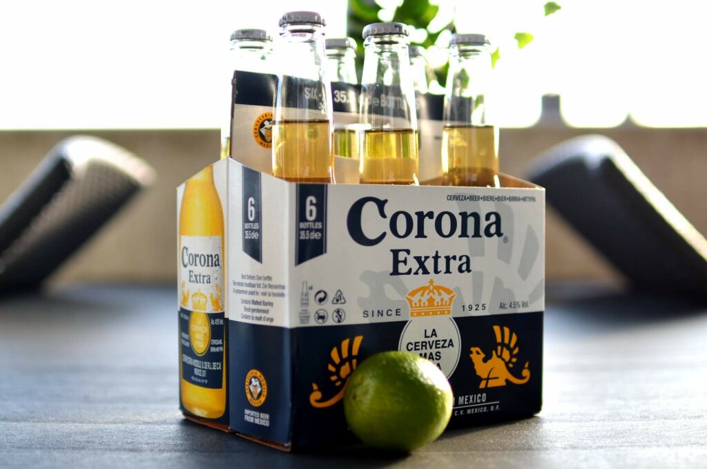 six pack of corona with a lime